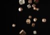 Live Dealer Games: Bridging the Gap between Online and Offline Casinos a group of dices flying in the air