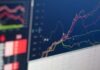 Augmenting Market Intelligence: Polkamarkets (POLK) and its Data-Driven Forecasting Platform close-up photo of monitor displaying graph