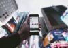 How to Leverage Instagram Live for Reliable Account-Based Marketing high angle photo of person holding turned on smartphone with tall buildings background