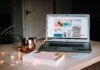Understanding E-commerce Analytics in Retail turned on Acer laptop on table near cup