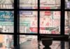Creating a Memorable Trade Show Booth with Light Boxes view of assorted signages through window
