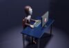 Is Telemarketing Fraud Still a Thing in the Age of the Internet? a skeleton sitting at a desk with a laptop and keyboard