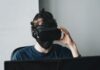 Virtual Reality Porn: How to Enjoy It man in blue crew neck shirt wearing black vr goggles