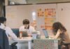 Transform Your Project Workflow: A Detailed Guide to SharePoint Implementation people using laptop