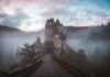 Castles in the Sky: Unveiling Slovakia’s Majestic Medieval Fortresses closeup photo of castle with mist