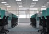 The Comprehensive Guide to Workplace Safety Protocols empty black rolling chairs at cubicles