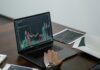 Breaking Barriers: Digital Yuan’s Role in Financial Inclusion Graph Displayed on Laptop Screen