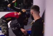 Understanding The UFC: It’s History And Popularity man in black crew neck t-shirt sitting on floor