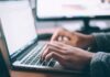 Automating Inside Sales Processes person using MacBook Pro