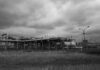 Midstream Money-making: Benefitting from Midstream Oil Trading Operations grayscale photo of train on rail tracks