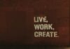 Unleashing Team Building Magic in the City That Never Sleeps: New York red brick wall with live, work, create. quote