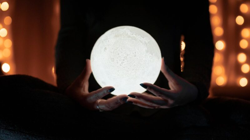 Photo by Gantas VaiÄŤiulÄ—nas White Moon on Hands