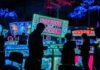 Tips and Tricks on How to Win at Slots people in front clear glass desk with lights