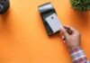 How to Legitimately Repair Your Credit: Understanding the Role of Companies person holding black and white electronic device