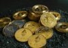 Navigating the Volatile Landscape of Crypto Gaming Investments a pile of bitcoins sitting on top of a pile of gravel