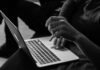 How to Read Odds grayscale photo of person using MacBook