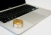 Decoding the NFT Revolution: Ethereum’s Influence on the Realm of Creative Ownership a laptop computer sitting on top of a white desk