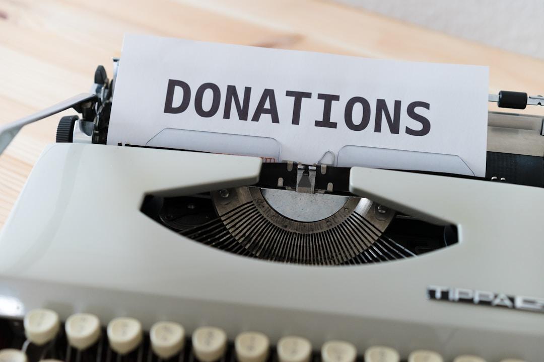 A typewriter page has "DONATIONS" written at the top.