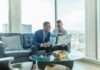 The Future of Finance: How Investment Education is Changing the Game two men in suit sitting on sofa