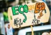 Conscious Complaining: Is It Possible to Complain Mindfully? person holding Eco Not Ego signage