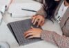 Generate Your Research Topics: 7 Tricks To Creating Unique Research Papers woman in red and white plaid long sleeve shirt using platinum coloured microsoft surface laptop computer