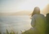 Can Your Wellness Business Thrive in a Competitive Market? Here’s How! woman wearing gray long-sleeved shirt facing the sea