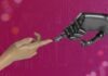 Optimize Your Business with Conversational AI Solutions two hands touching each other in front of a pink background