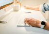 Why Centralized Data is the Key to Business Success person using iMac