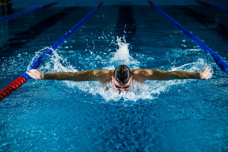 Photo by Gentrit Sylejmani man doing butterfly stroke