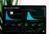 Analysis on Economic Calendar: Tracking News and Events graphs of performance analytics on a laptop screen