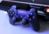 How Big Mergers and Acquisitions Are Influencing the Gaming Industry black Sony PS2 controller on white surface