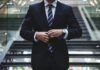 Should I Consult A Financial Advisor For My Investment Strategy? person standing near the stairs