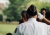 Unlocking Entrepreneurial Success: Top Business Resources Every Veteran Needs man wearing white uniform saluting