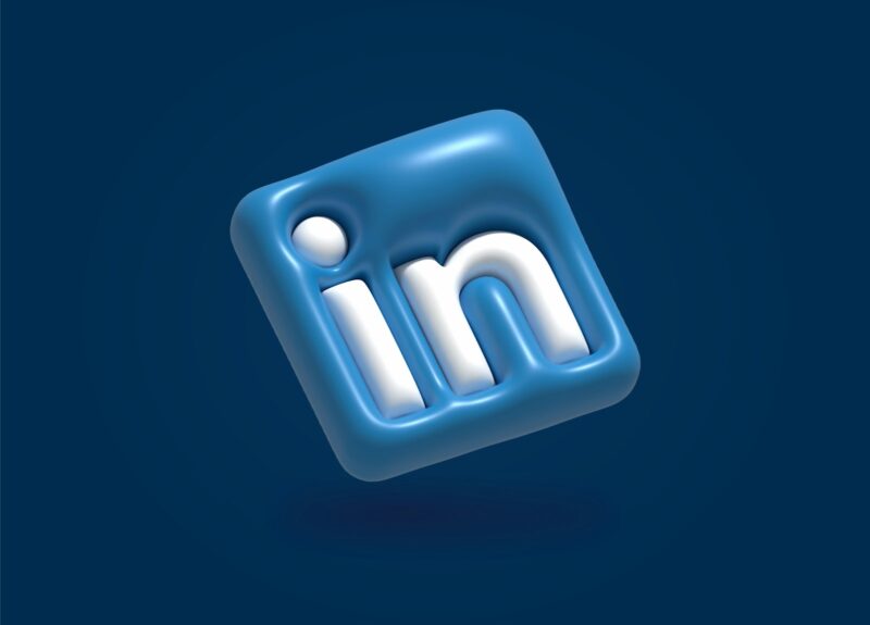 Photo by Abid Shah a blue and white linked icon on a blue background