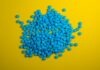 Difference between Viagra (Sildenafil) or Cialis (Tadalafil) — Which Is Better for Men a pile of blue pills on a yellow background