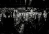 Lucky Star Casino: Where Luck and Winnings Go Hand in Hand grayscale photo of man playing slot machine
