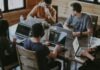 Bridging the Skills Gap: How Tech Literacy Training is Driving Employee Performance group of people using laptop computer
