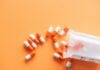 What Are The Best Materials For Eco-Friendly Pharmaceutical Packaging? orange and white medication pill
