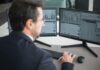 Beyond Firewalls: Why Penetration Testing is Key to Comprehensive Cybersecurity for Small Businesses Man in Black Suit Jacket Using Computer