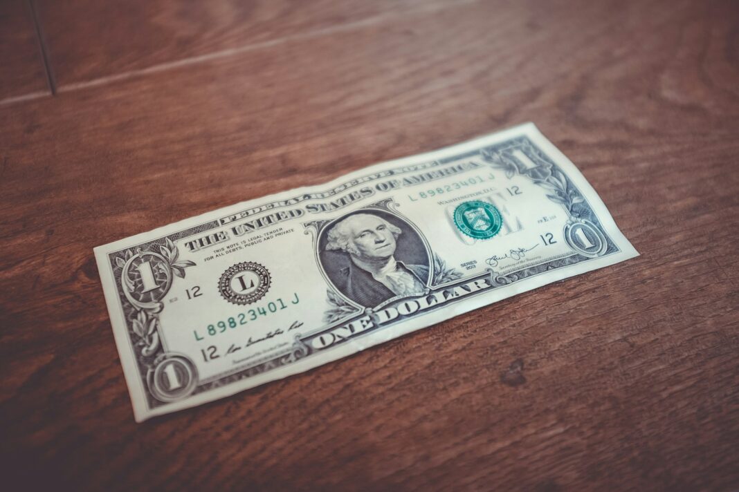 Photo by Kenny Eliason 1 US dollar banknote close-up photography