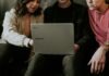 4 Unique Team-Building Activities That Improve Communication and Collaboration person using laptop