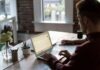 How to Use iTop VPN to Protect Your Online Privacy: A Step-by-Step Guide man operating laptop on top of table
