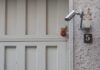 Top 5 Mistakes to Avoid When Installing CCTV Cameras white wooden door near gray security camera