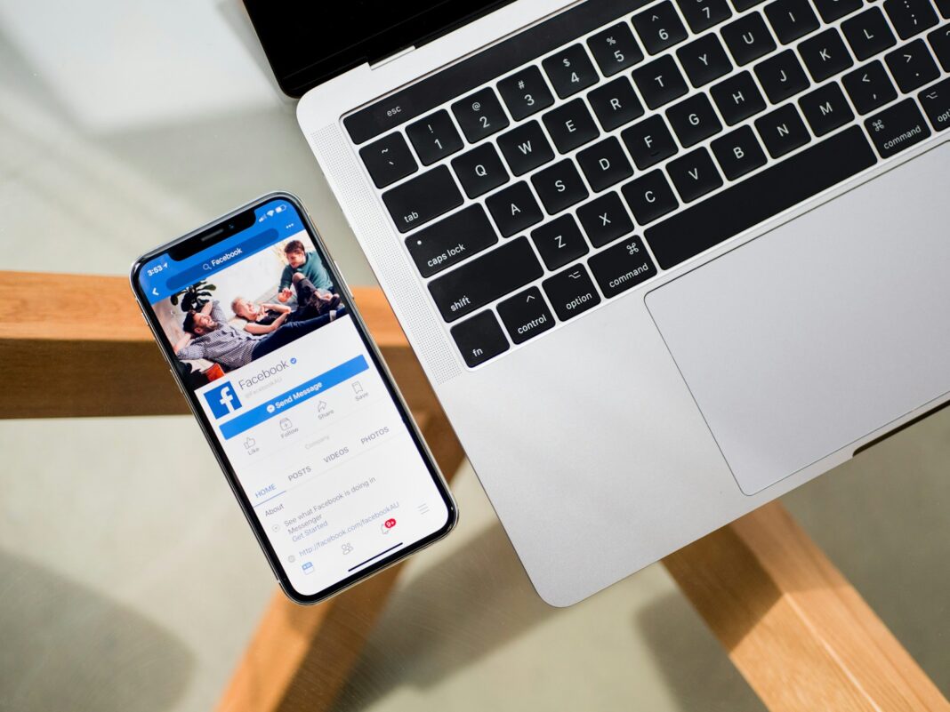 Photo by Timothy Hales Bennett iPhone X beside MacBook