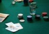 Bluffing is A Key Skill in Poker and Sports Betting a table with poker chips and cards
