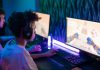 The Evolution of Online Gaming: How Technology Is Transforming Entertainment Teen gamers engrossed in online computer game in a vibrant, modern gaming room.