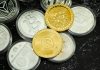 Bitcoin’s Continuous Challenges Hinder Progress Towards Price Consolidation a pile of coins sitting on top of a table
