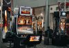 Top Tips to Maximize Your Online Sweepstakes Casino Game Wins a row of slot machines sitting next to each other
