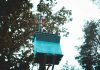 How Routine Transformer Maintenance Saves Time and Money blue and white concrete building near green trees during daytime