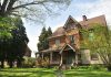 How City Planning Affects Housing Affordability brown brick house near green grass field and trees during daytime
